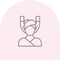 Person with towel and hair curling tools.